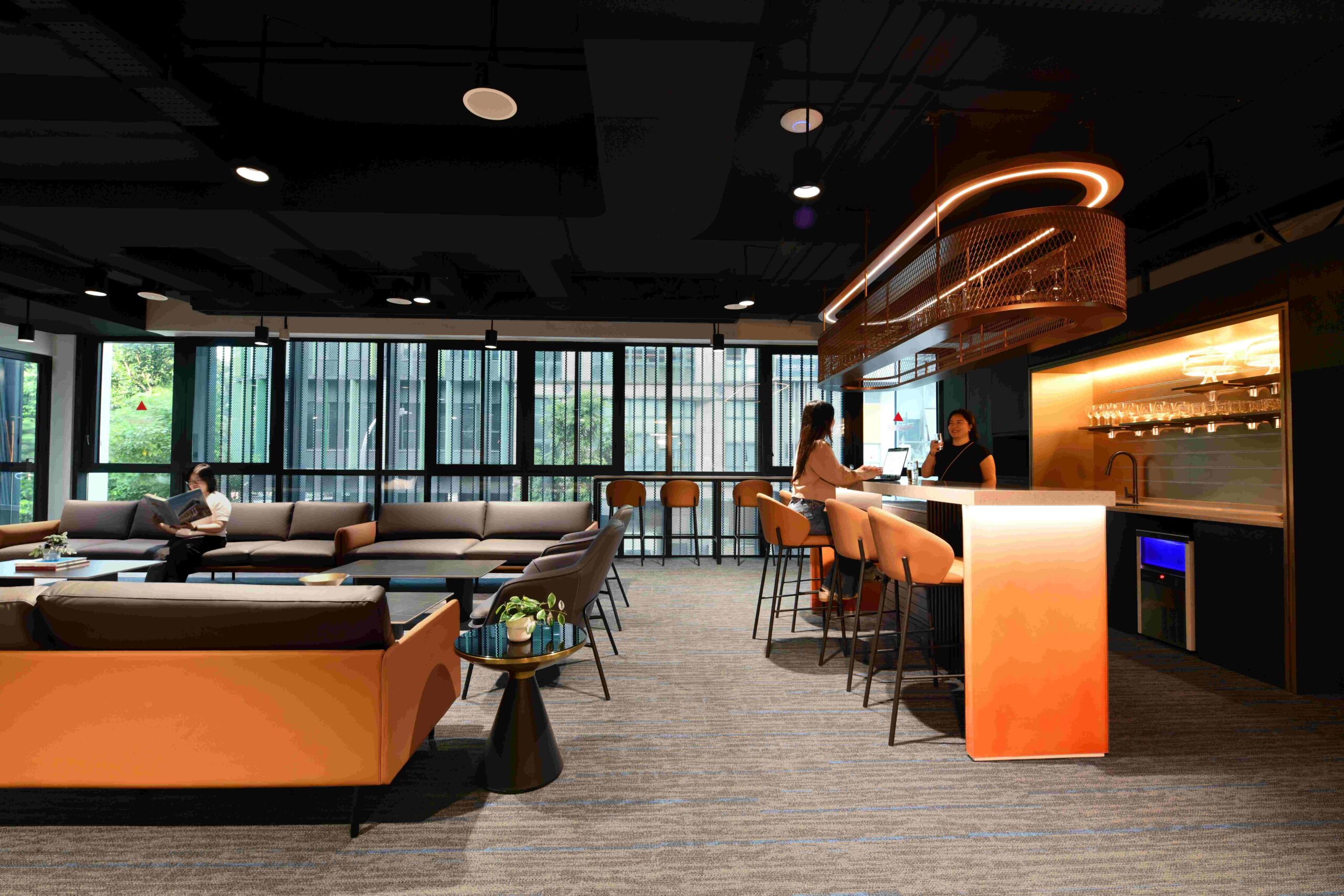 Orange theme office with grey carpet